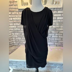 Black dress with chiffon draping.